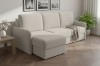 Gemütliches beiges Ecksofa in L-Form im modern eingerichteten Wohnzimmer.