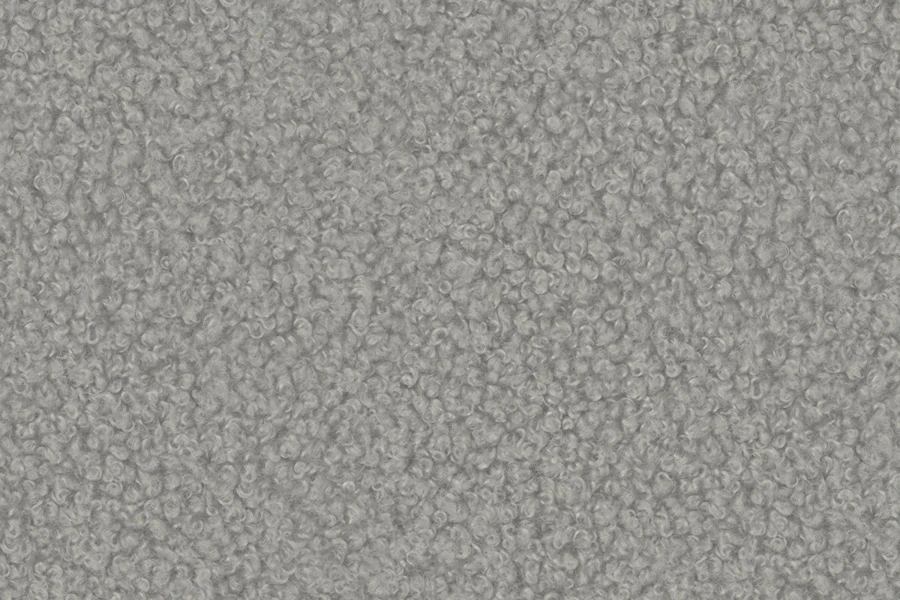 Grauer Bouclé-Stoff mit weicher Teddy-Struktur, Detailaufnahme der Textur.