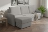 Stilvolles graues Ecksofa im Wohnzimmer mit Parkett und Zimmerpflanze.