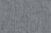 Nahaufnahme der hellgrauen Textilstruktur eines Sofabezugs, hochwertiger Webstoff.