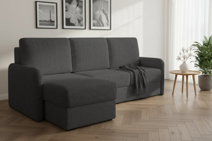 Dunkelgraues Ecksofa in L-Form in einem modernen Wohnzimmer mit Parkettboden.