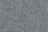 Detailansicht der groben Webstruktur eines dunkelgrauen Sofa-Polsterstoffes.