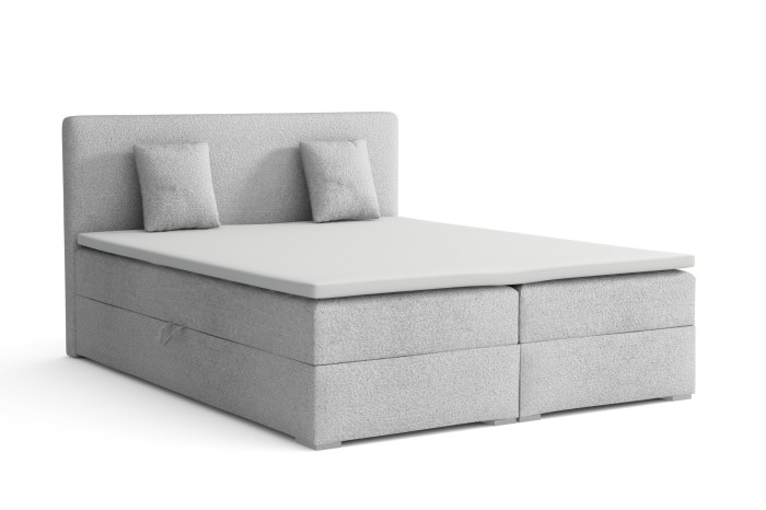 Komplettes Boxspringbett in Hellgrau mit Bouclé-Bezug, Kopfteil und zwei Kissen.