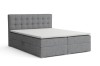 Hellgraues Boxspringbett mit gepolstertem Kopfteil und weißem Topper.