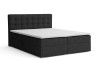 Anthrazitfarbenes Boxspringbett mit weißem Topper auf weißem Hintergrund.