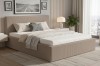 Gemütliches Schlafzimmer mit modernem Polsterbett im beigen Cord-Look und passender Matratze.