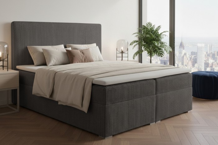 Antracietkleurig boxspringbed van ribstof voor een stadspanorama.