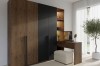 Ein Schlafzimmer-Set mit Kleiderschrank, Schminktisch und Sitzhocker in modernem Design.