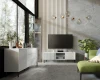 Modernes Wohnzimmer mit weißem Sideboard und TV-Lowboard vor großer Fensterfront.