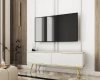 Modernes weißes TV-Board mit Goldfüßen in stilvollem Wohnzimmer-Ambiente.