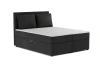 Modernes Boxspringbett in Anthrazit mit Cord-Bezug und gepolstertem Kopfteil.