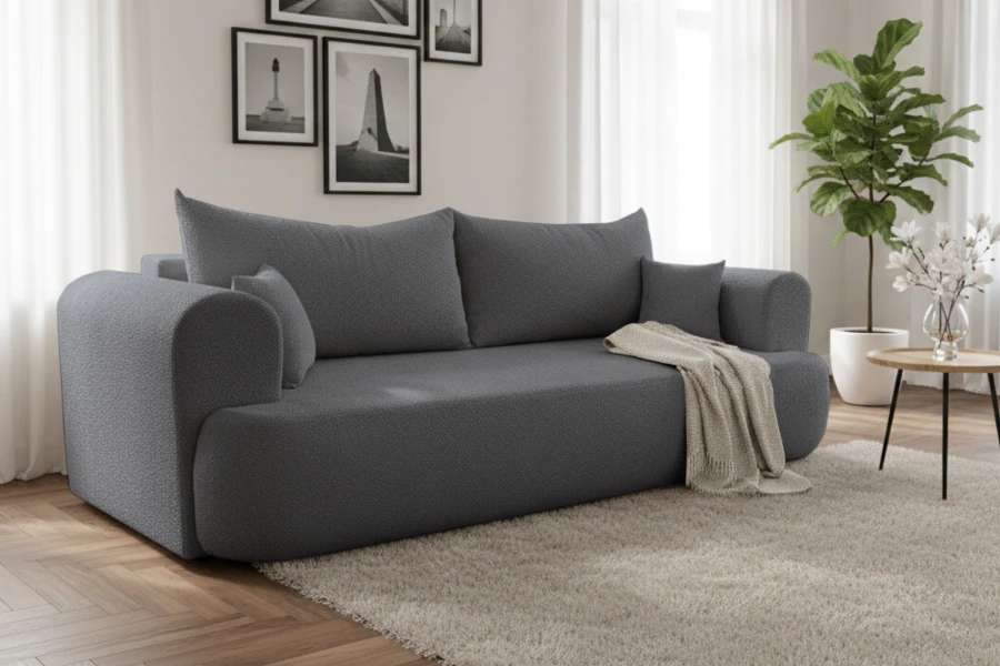 Großzügiges dunkelgraues Sofa im modernen Wohnzimmer mit Teppich und Pflanze.