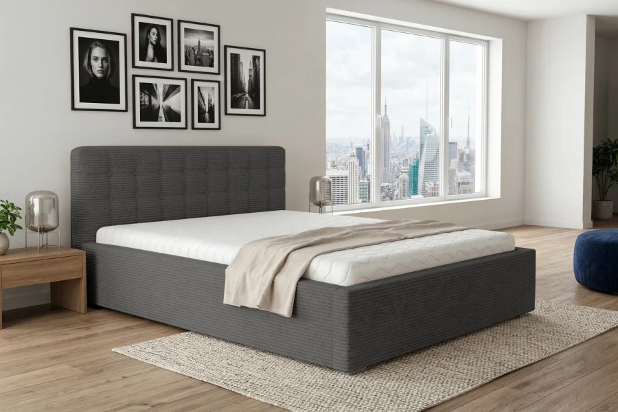 Modernes anthrazitfarbenes Polsterbett in einem hellen Schlafzimmer mit Aussicht.