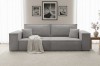 Graues Cord-Sofa mit weicher Textur in einem modern eingerichteten Wohnzimmer