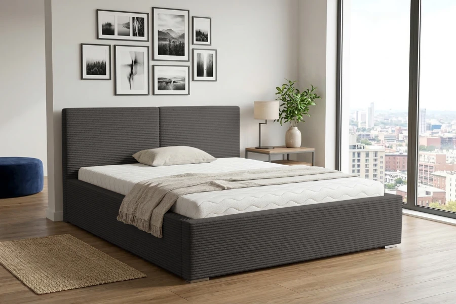 Modernes Polsterbett in Dunkelgrau mit Cord-Bezug im hellen Schlafzimmer mit Stadtblick.