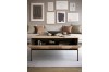 Couchtisch FAVOS aus Holz mit gewellter Front und offenem Stauraum.