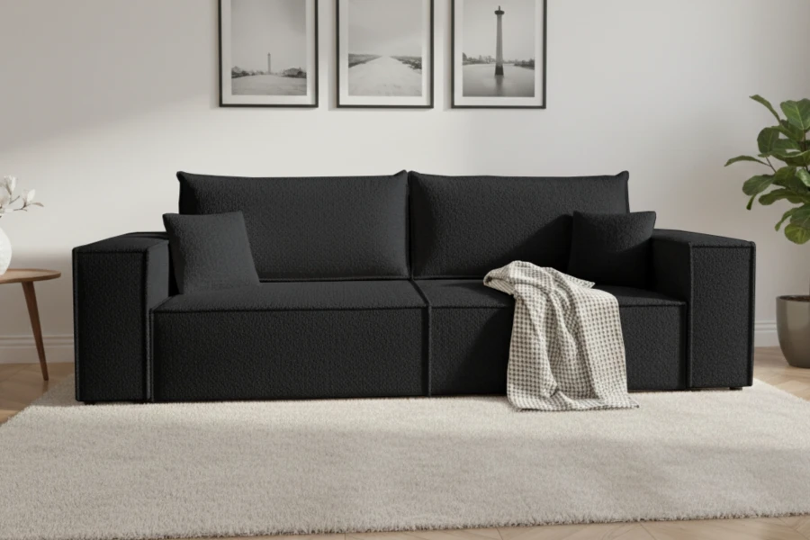 Elegantes anthrazitfarbenes Sofa in einem modernen Wohnzimmer.