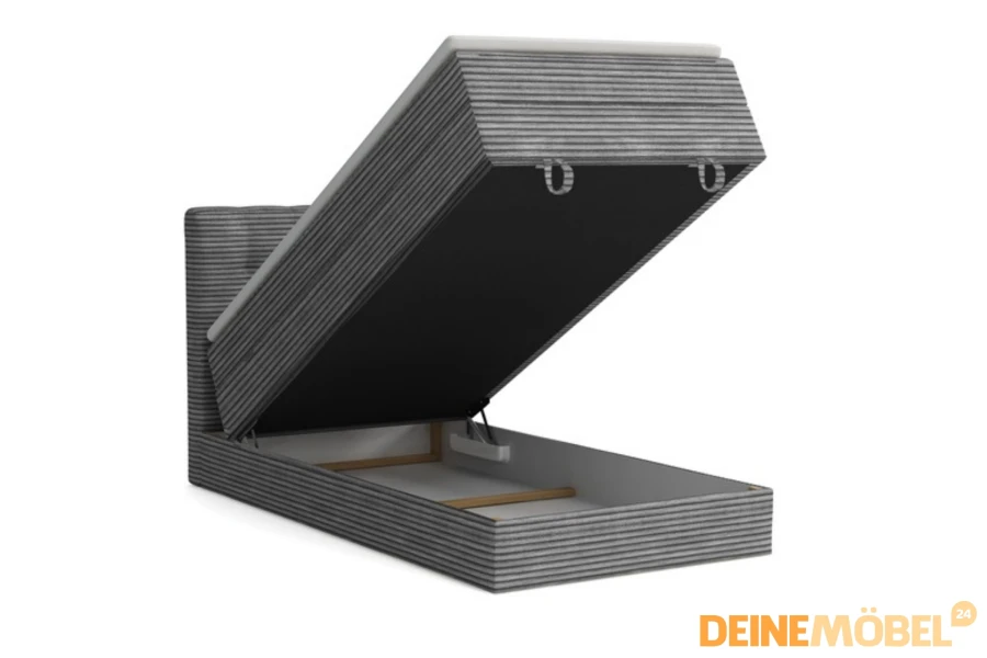 Boxspringbett mit Stauraum durch einen praktischen Bettkasten.