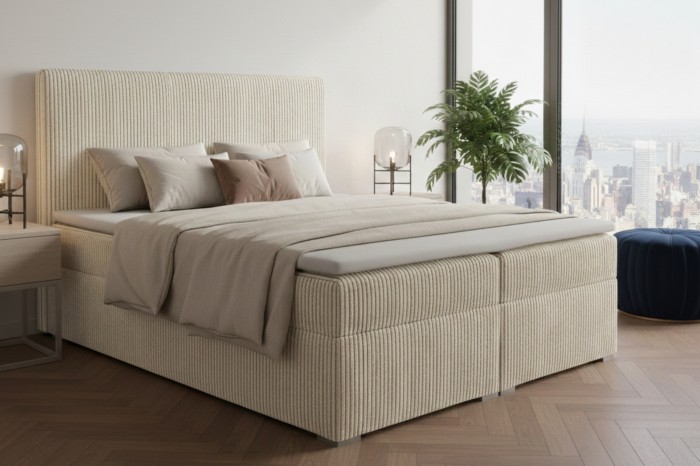 Beiges Cord-Boxspringbett im eingerichteten Schlafzimmer mit Stadtpanorama.