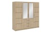 Großer Kleiderschrank in Eiche-Optik mit Spiegeltüren und drei Schubladen.