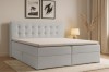 Hellgraues Boxspringbett im modern gestalteten Schlafzimmer-Ambiente.