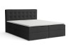 Dunkelgraues Boxspringbett mit gestepptem Kopfteil und weißem Topper auf weißem Hintergrund.