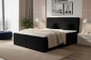 Stilvolles schwarzes Boxspringbett mit strukturierter Oberfläche für ein modernes Ambiente.