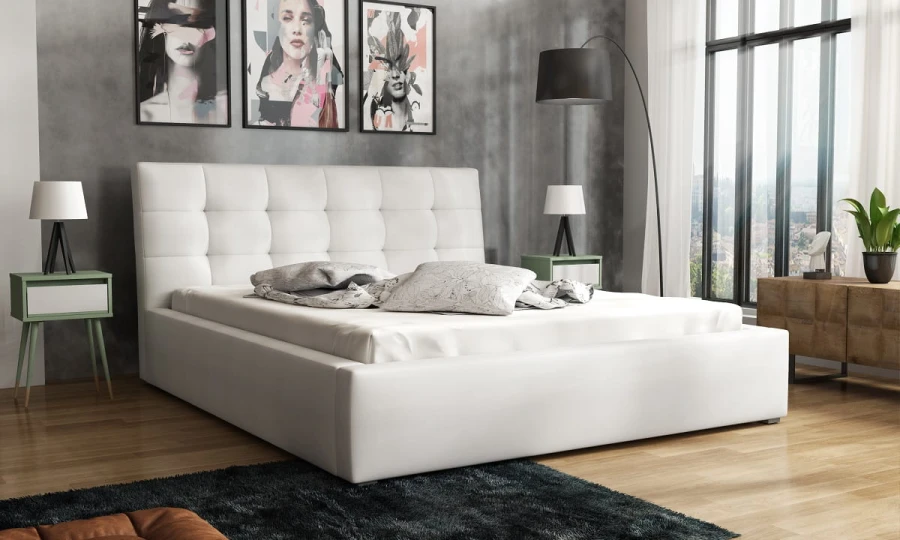 Modernes weißes Polsterbett mit gestepptem Kopfteil für ein stilvolles Schlafzimmer.