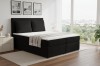 Modernes schwarzes Boxspringbett mit Cord-Optik für ein stilvolles Schlafzimmer.