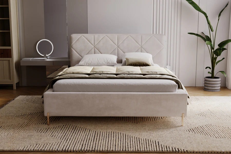 Beiges Polsterbett mit Rautensteppung und schlanken Metallbeinen in hellem Schlafzimmer.