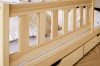 Kinderbett aus Kiefernholz mit sicherem Rausfallschutz und praktischer Bettschublade.