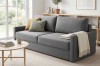 Stilvolles mittelgraues Sofa in modernem Wohnzimmer mit Holzmöbeln.