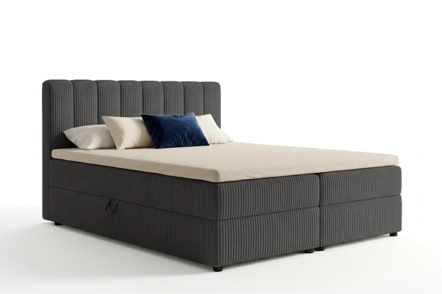 Dunkelgraues Boxspringbett mit geripptem Stoffbezug und Bettkasten-Funktion auf weißem Hintergrund.