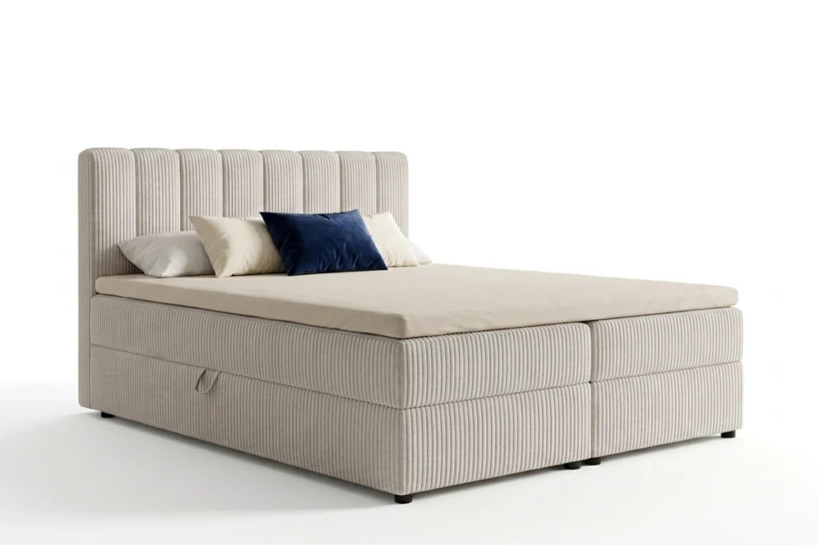 Beiges Boxspringbett mit Cord-Bezug, hohem Kopfteil und praktischem Bettkasten.