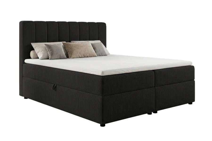 Dunkelgraues Boxspringbett mit Cord-Bezug und hohem Kopfteil, freigestellt.