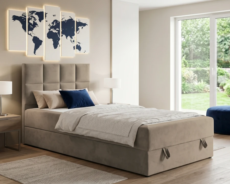 Beiges Polsterbett mit gestepptem Kopfteil und Bettkasten in hellem Schlafzimmer.