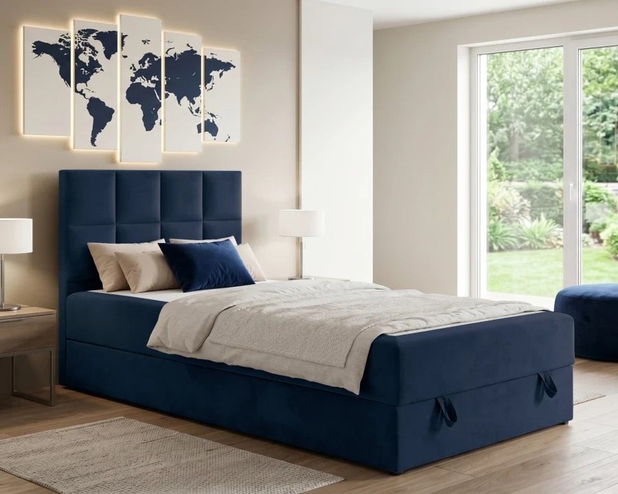 Elegantes dunkelblaues Boxspringbett mit gepolstertem Kopfteil und Bettkasten.