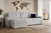 Ecksofa in Hellgrau im Wohnzimmer mit dekorativer Weltkarte.