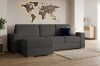 Modernes Wohnzimmer mit dunkelgrauem Ecksofa und Weltkarte.
