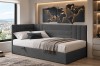 Graues Polster-Eckbett mit gemütlicher Liegefläche und modernem Wandbild.