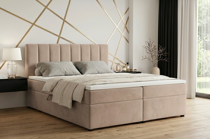 Modernes Boxspringbett in Taupe in stilvoller Schlafzimmerumgebung.