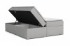Graues Boxspringbett mit geöffnetem Bettkasten für praktischen Stauraum.