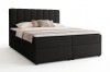 Elegantes Boxspringbett in Schwarz mit vertikal gestepptem Kopfteil.