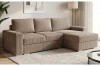 L-förmiges Sofa in Beige mit Cordstoff, Ottomane rechts, gemütliches Interieur.