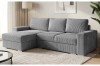 Graues Cordsofa L-Form im modernen Wohnzimmer mit Ottomane links