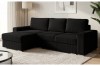 Stilvolles schwarzes Ecksofa mit Cord-Bezug und Ottomane links im Wohnraum.