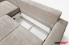 Innenansicht des Bettkastens eines Cord-Sofas mit Stauraum-Funktion.