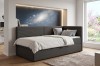 Modernes Boxspring-Einzelbett in Anthrazit mit Galaxy-Wandbild und LED-Beleuchtung im Zimmer.