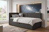 Anthrazitfarbenes Daybed mit Stauraum vor Galaxie-Fototapete in einem hellen Schlafzimmer.