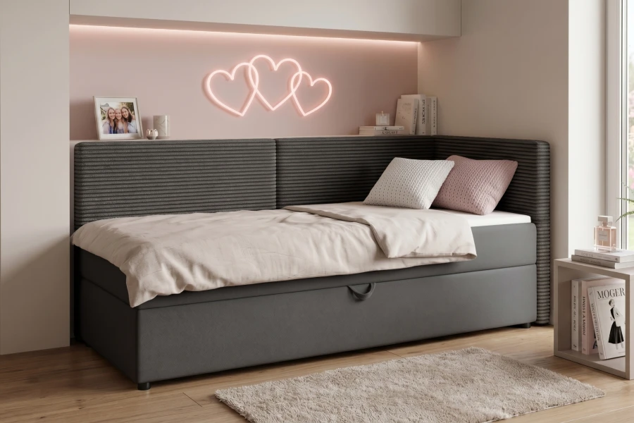 Graues Boxspring-Daybed mit Herz-Neonlicht und dekorativen Kissen im modernen Jugendzimmer.